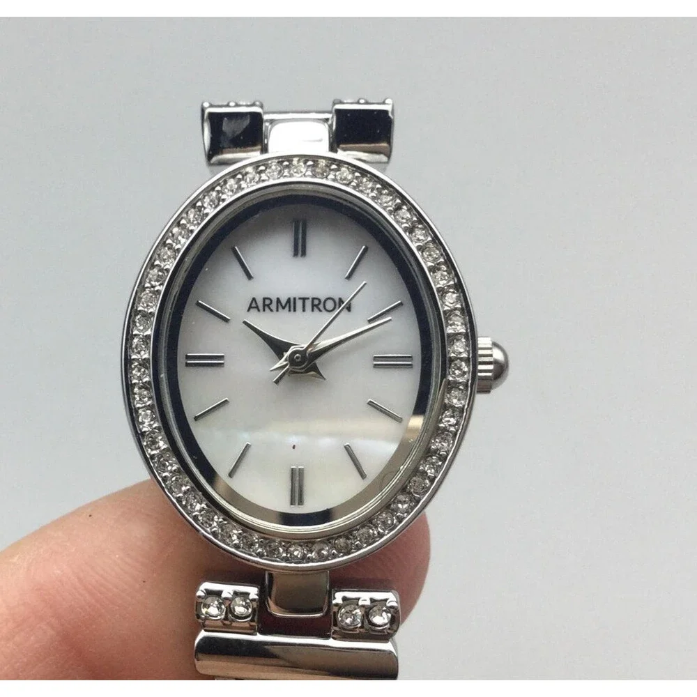 Armitron Womens Watch 21mm White Oval Dial Silver Tone Crystals New Battery 7.5